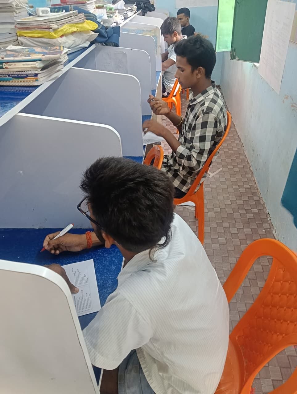Students studying at the EERA library desks